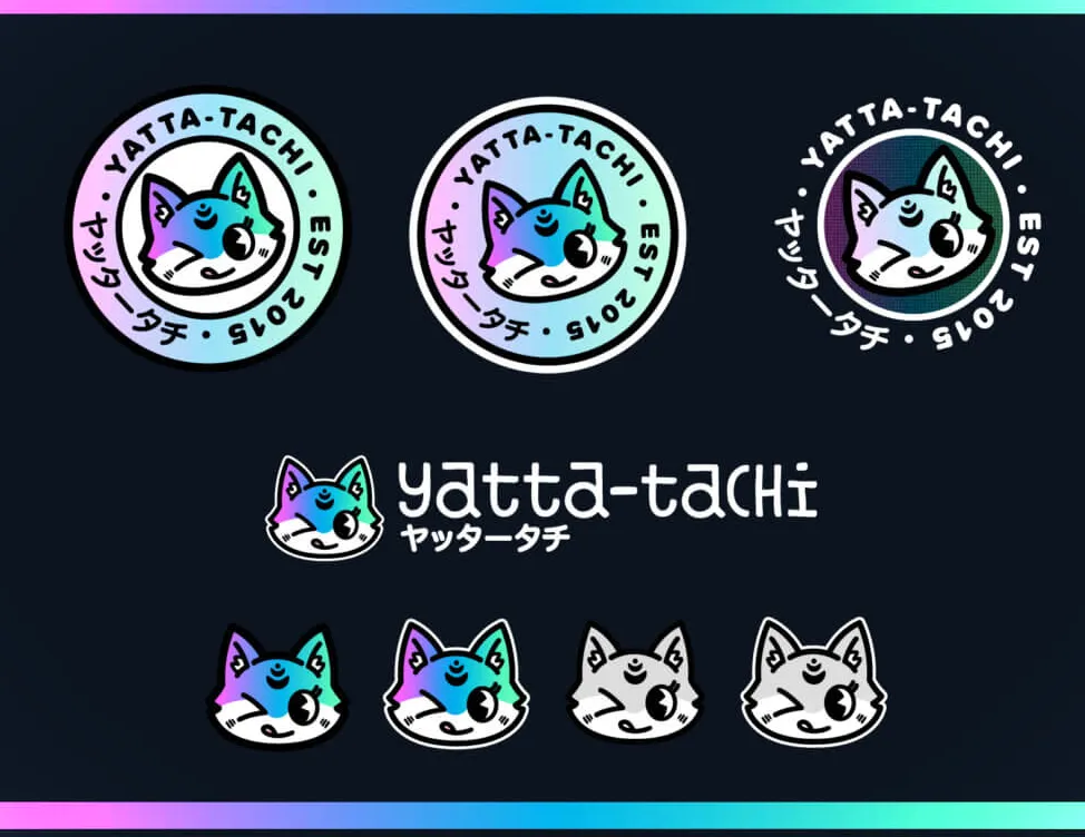 El nuevo logo de Yatta-Tachi remezclado de varias maneras: varias insignias, versión con nuestro nombre en japonés y el zorro en diferentes estilizaciones.