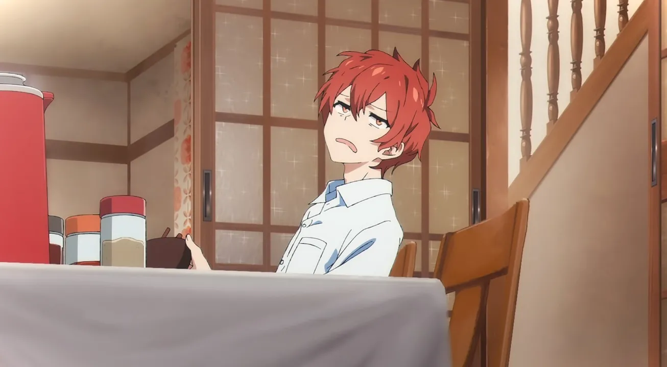 Akira hace una mueca ante la comida de su madre.