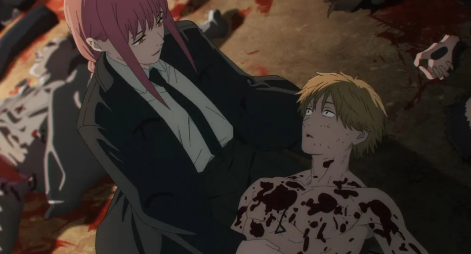 Makima acunando la cabeza de Denji en su regazo.