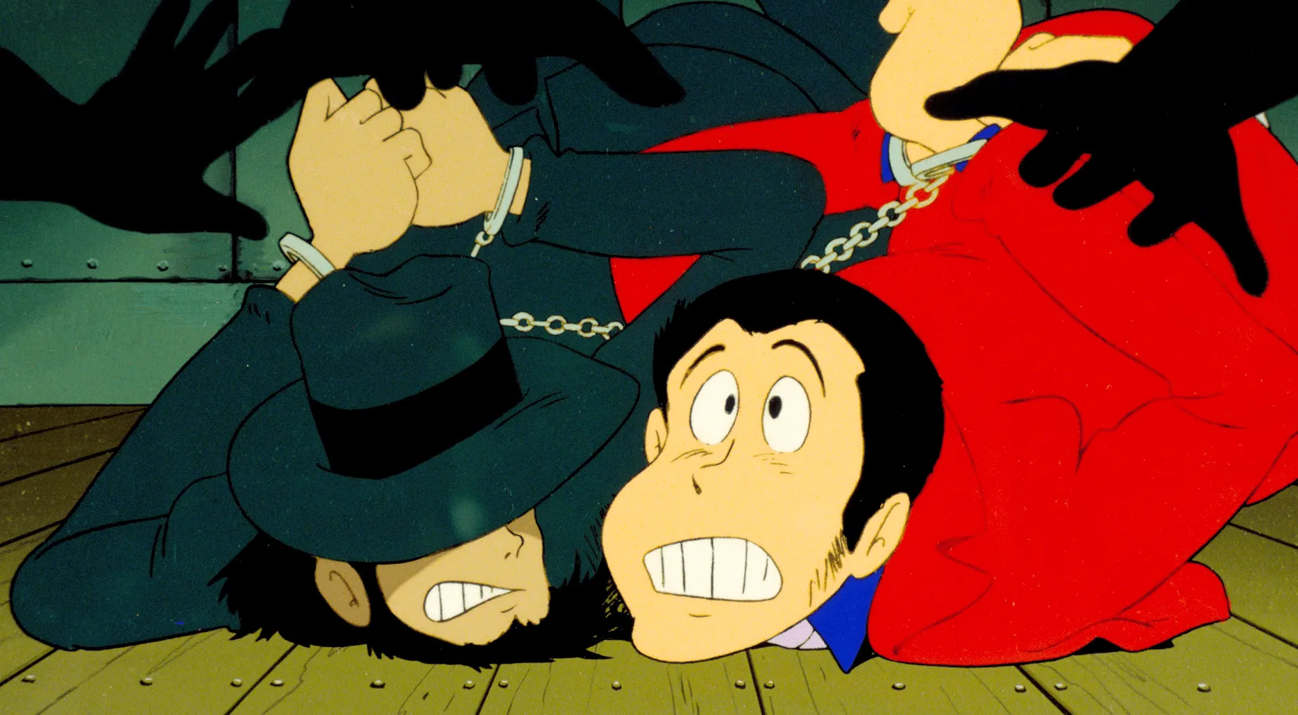 Lupin y Jigen esposados