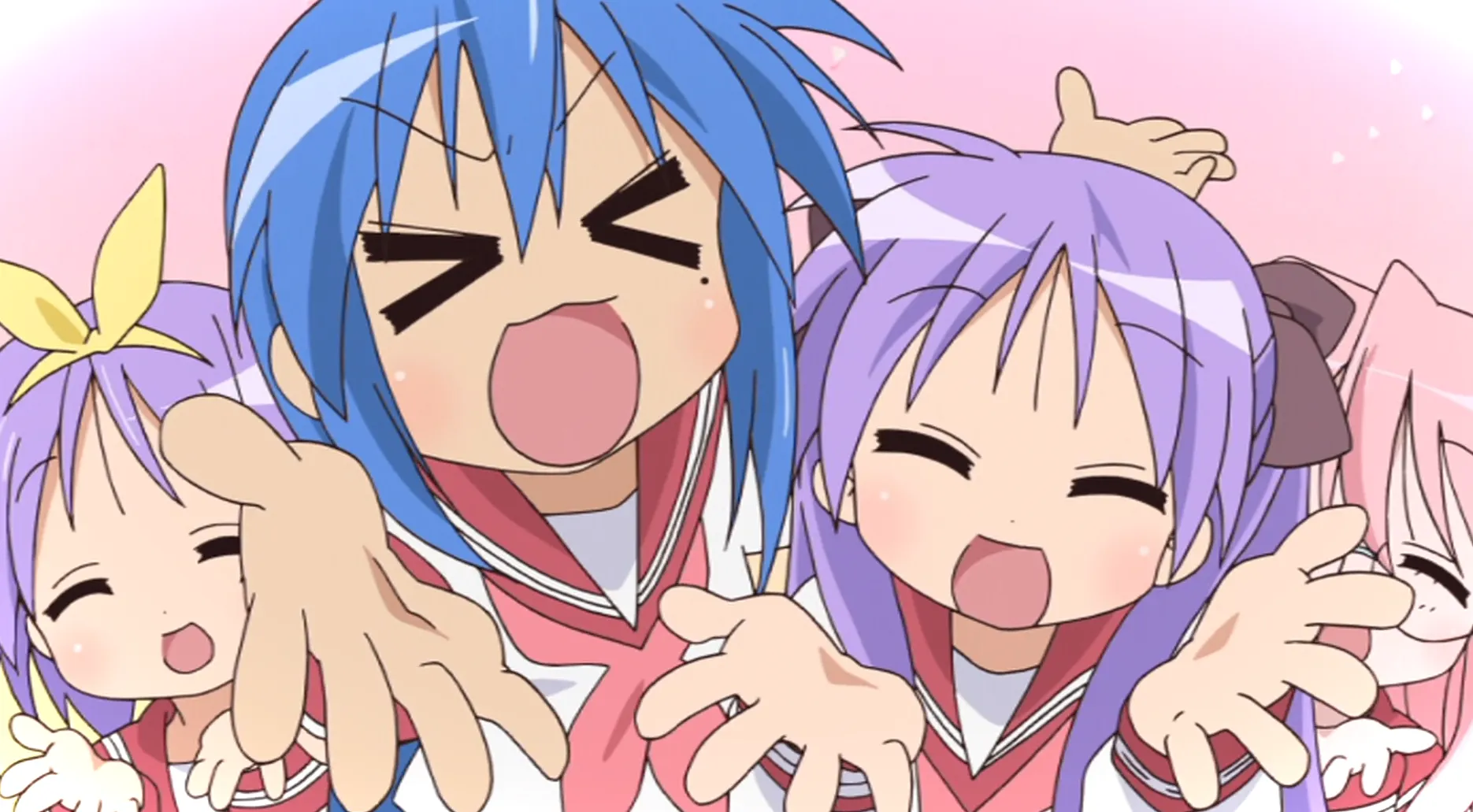 El elenco principal de Lucky Star saltando hacia la cámara y posando.
