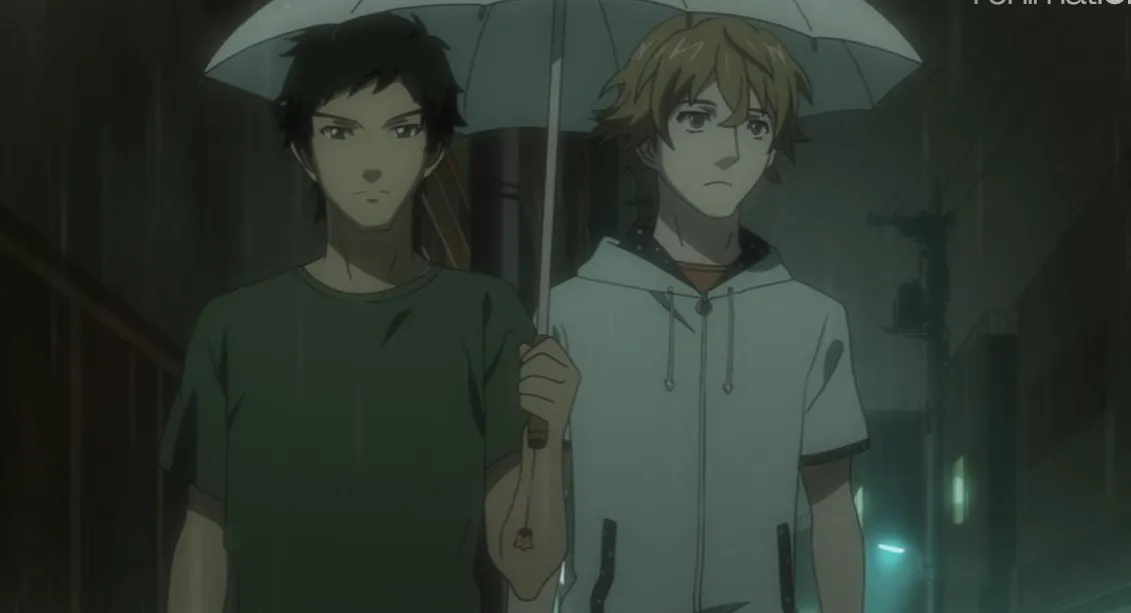 Masayoshi y Goto compartiendo un paraguas